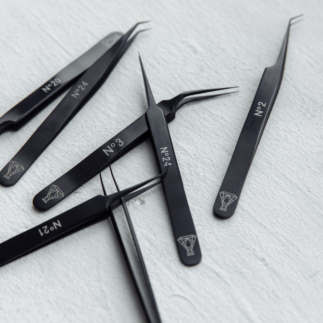 7 black isolation tweezers 